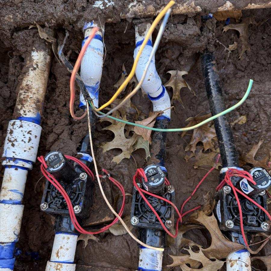 Valves and wiring dug out of the soil for repair